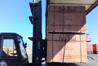 loading plywood on a truck